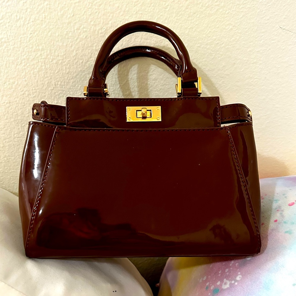 Shiny mini purse clean like new condition. Classy